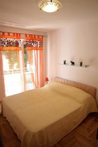 Łóżko lub łóżka w pokoju w obiekcie Guesthouse Rovinj (4285)