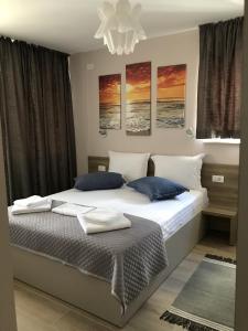 Ένα ή περισσότερα κρεβάτια σε δωμάτιο στο Medusa Mamaia Nord
