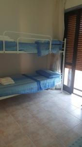 Fotografie z fotogalerie ubytování Casa Vacanza Costa Rossa vista mare v destinaci Trinità dʼAgultu