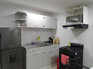 Køkken eller tekøkken på APTO INTERIOR