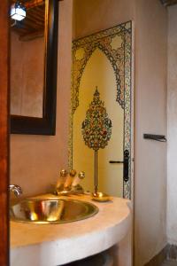Koupelna v ubytování Riad Amira