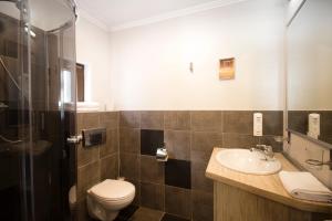 Koupelna v ubytování Hotel Niedźwiadek
