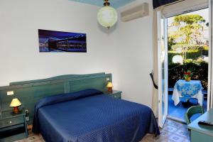 Posezení v ubytování Hotel La Ninfea