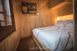 Posteľ alebo postele v izbe v ubytovaní Abadía de Montenartró Apartamentos