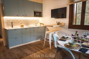 Kuchyňa alebo kuchynka v ubytovaní Abadía de Montenartró Apartamentos