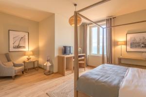 Boutique hôtel Château Rouher客房内的一张或多张床位