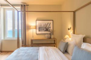 Boutique hôtel Château Rouher客房内的一张或多张床位