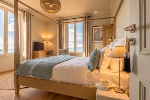Boutique hôtel Château Rouher客房内的一张或多张床位