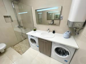 Kúpeľňa v ubytovaní Apartmani Oaza + 37 fotografií