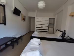 Postel nebo postele na pokoji v ubytování Hotel Rania
