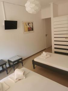 Postel nebo postele na pokoji v ubytování Hotel Rania