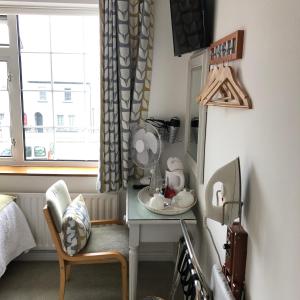 TV a/nebo společenská místnost v ubytování Petra House B&B