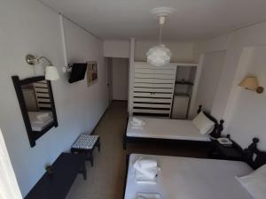 Postel nebo postele na pokoji v ubytování Hotel Rania