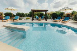 Bazén v ubytovaní Gennadi Dreams Holiday Villa alebo v jeho blízkosti