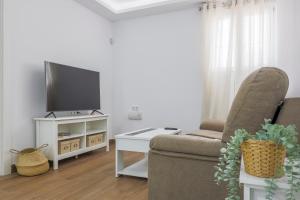 A television and/or entertainment centre at Cádiz caleta de cádiz 1