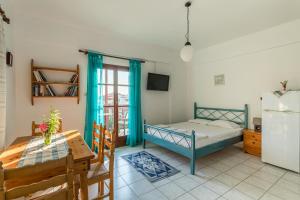 Postel nebo postele na pokoji v ubytování Penelope Apartments