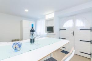 Televízia a/alebo spoločenská miestnosť v ubytovaní Apartment Gobac