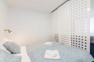 Posteľ alebo postele v izbe v ubytovaní Apartment Gobac