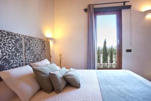A bed or beds in a room at S'Hort de Son Caulelles - Adults Only Még 37 kép