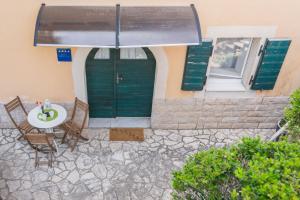 Patio alebo iná vonkajšia časť ubytovania Apartment Gobac