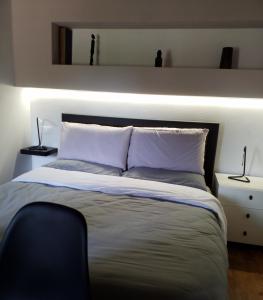 Ένα ή περισσότερα κρεβάτια σε δωμάτιο στο Contemporary Rooms