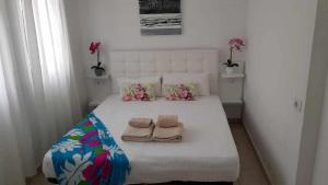 Posteľ alebo postele v izbe v ubytovaní Apartamento Vista Lobos + 8 fotografií