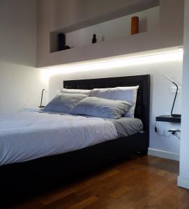Ένα ή περισσότερα κρεβάτια σε δωμάτιο στο Contemporary Rooms