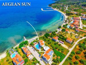 an aerial view of a beach next to the ocean at Aegean Sun Hotel in Skala Rachoniou