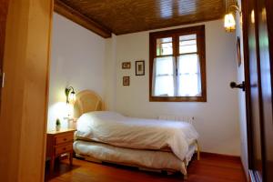 Postel nebo postele na pokoji v ubytování Apartamento rùstico Escunhau