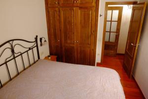 Postel nebo postele na pokoji v ubytování Apartamento rùstico Escunhau