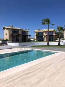 The swimming pool at or close to Villa fotini