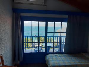 Postel nebo postele na pokoji v ubytování Blue Garden