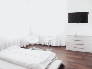 Postel nebo postele na pokoji v ubytování Květkův apartmán