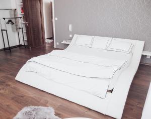 Postel nebo postele na pokoji v ubytování Květkův apartmán