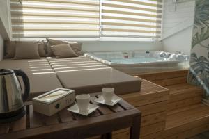 Posteľ alebo postele v izbe v ubytovaní Luxmarì Hotel & Spa