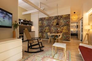Kuchyň nebo kuchyňský kout v ubytování Little Suite Apartments