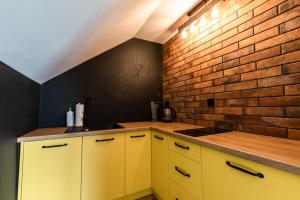 Kuchyňa alebo kuchynka v ubytovaní Stylowe Apartamenty Plewiska