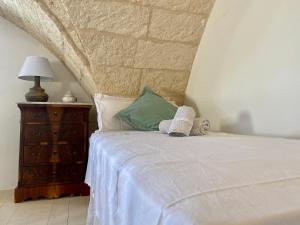 Ένα ή περισσότερα κρεβάτια σε δωμάτιο στο Ca Strignano Suite, Typical House