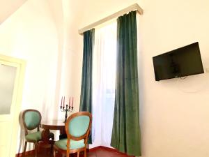 Μια τηλεόραση ή/και κέντρο ψυχαγωγίας στο Ca Strignano Suite, Typical House