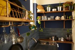 A kitchen or kitchenette at Mosaics aprtm in the Historical centre with Acropolis view