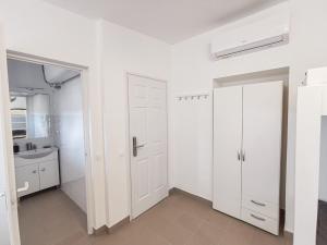 Dapur atau dapur kecil di Greenfield Apartman