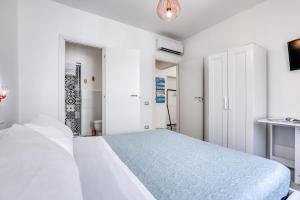 Postel nebo postele na pokoji v ubytování INTERZASTRADA B&B