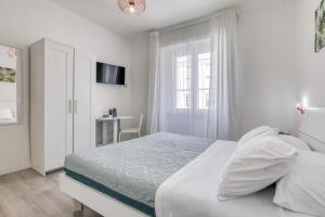 Postel nebo postele na pokoji v ubytování INTERZASTRADA B&B