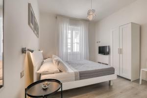 Postel nebo postele na pokoji v ubytování INTERZASTRADA B&B