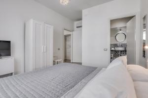 Postel nebo postele na pokoji v ubytování INTERZASTRADA B&B