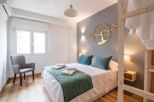 A bed or beds in a room at tuGuest S. Jerónimo Apartment