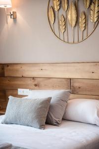 A bed or beds in a room at tuGuest S. Jerónimo Apartment