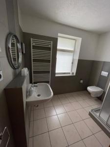 Koupelna v ubytování Hotel Garni „zum Bären“