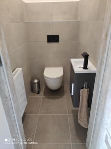 Kúpeľňa v ubytovaní Sweet Home Apartments + 5 fotografií