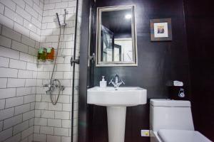 Koupelna v ubytování 4 Design Inn